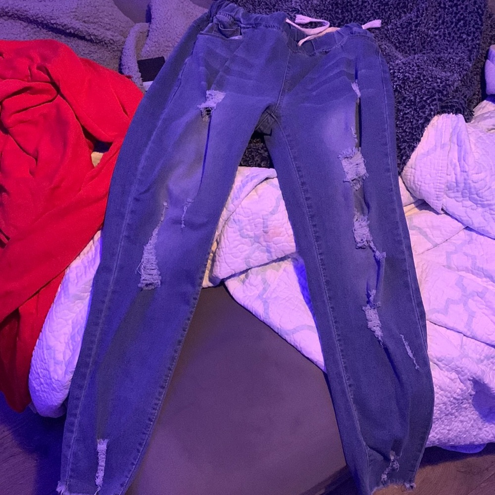 Dark blue ripped skinny jeans medium with string to tie